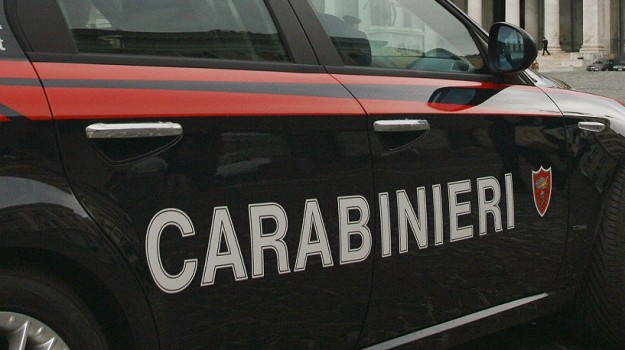 A car of Italian carabinieri patrols Pia